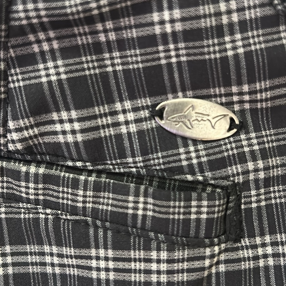 Men’s golf shorts by Greg Norman size 38.